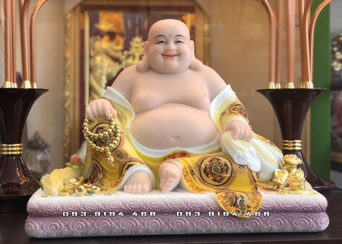 Phật Di Lặc hình nền ngồi tự tại trên đá xanh